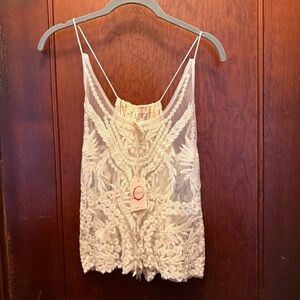 Raga Women’s new with tags size medium sheer embroidered lace tank.
